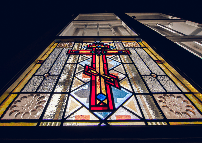 why do churches have stained glass windows liturgical
